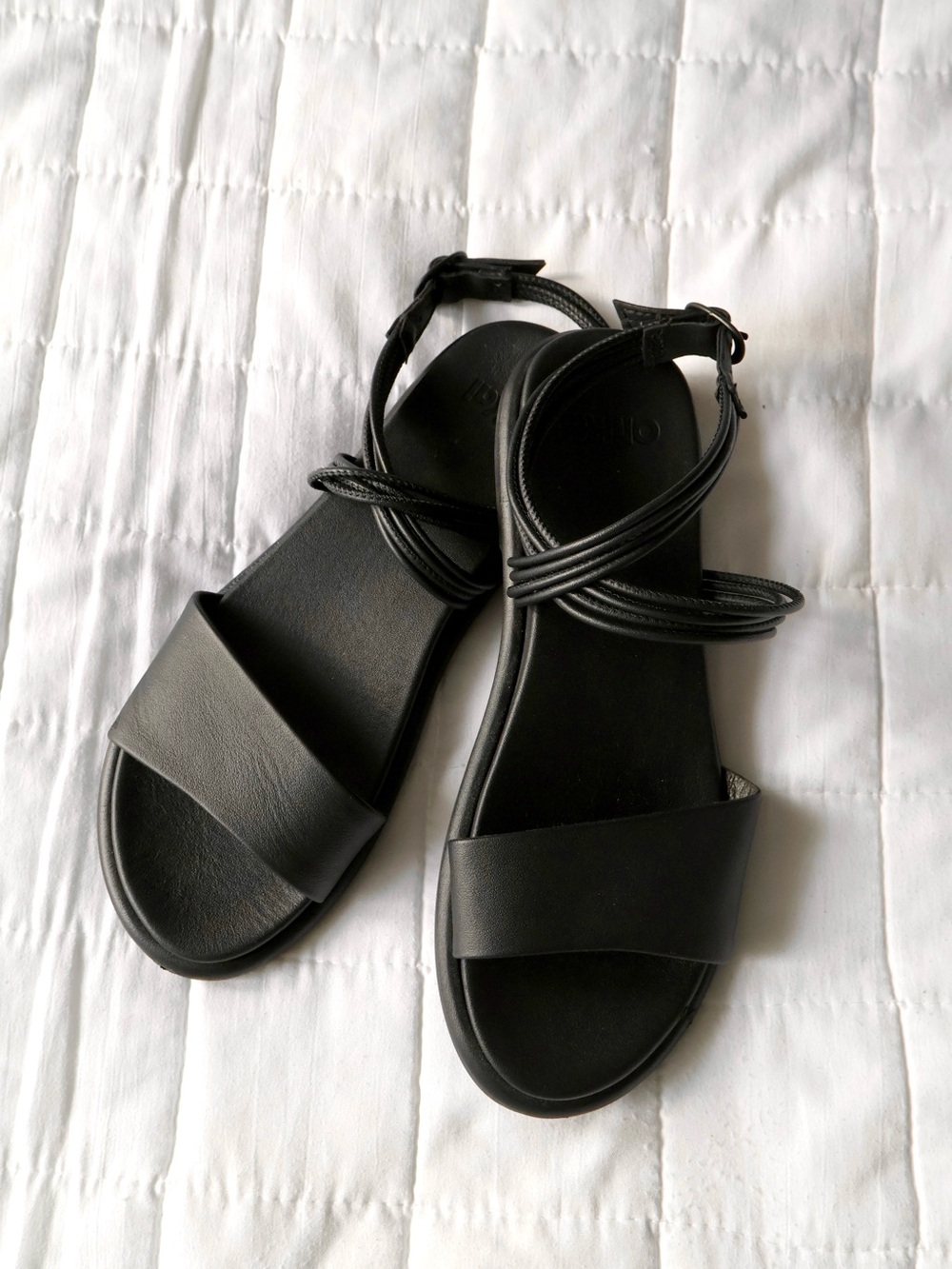 OluKai Black Strappy Leather Flat Sandals